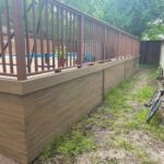 raised pool composite deck exterior wall