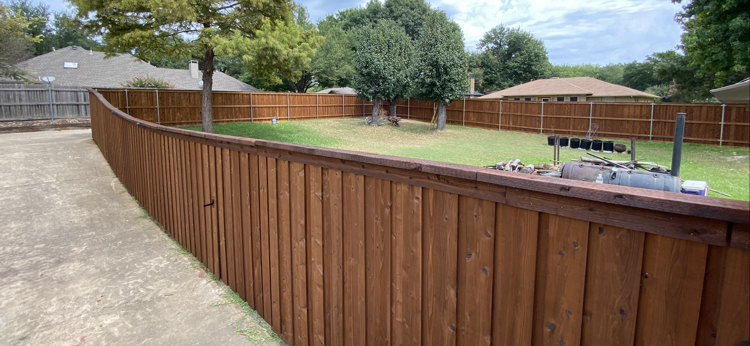 8-ft-board-on-board-cedar-stained-duncanville-texas-with-boxes-on-poles-steel-poles